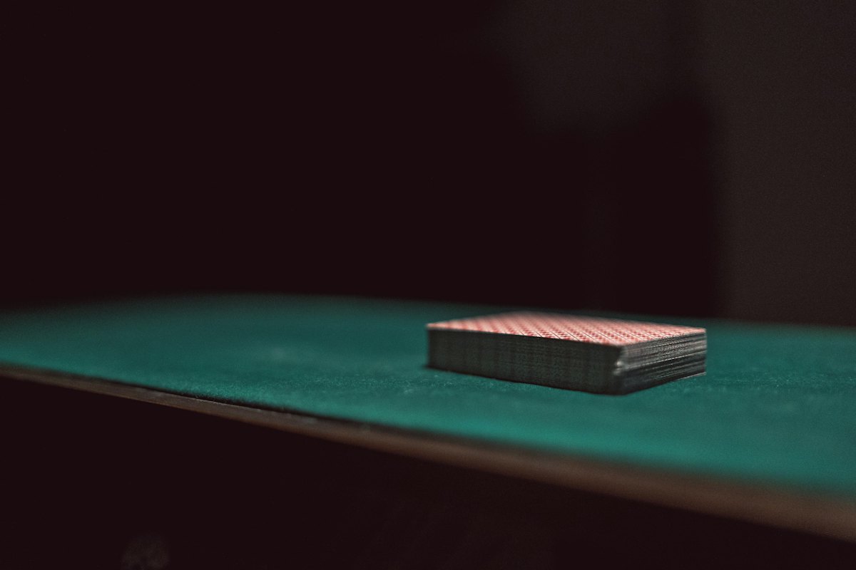 Deck of cards on a green tabletop